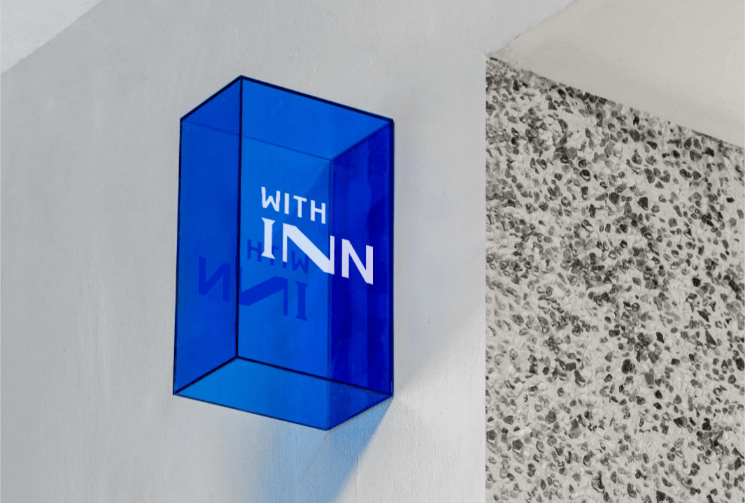 Blue signage with Withinn logo.